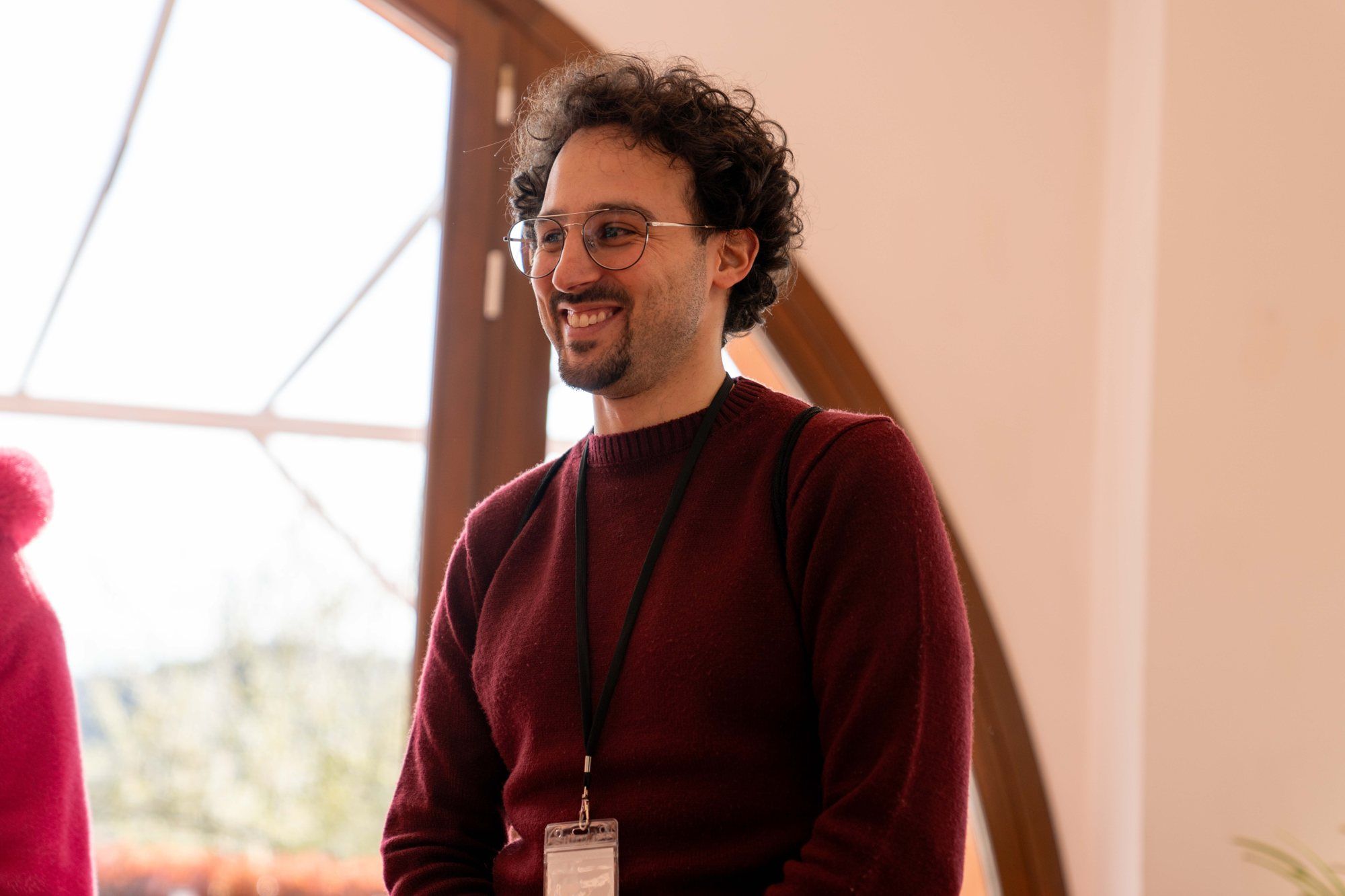 A participant smiles during Change Your Life Leadership